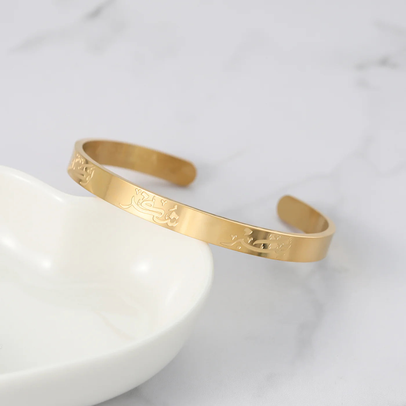 Sabr Shukr Tawakkul gold cuff bracelet with Arabic calligraphy
